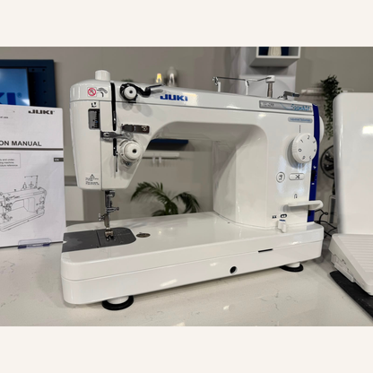 Juki TL-2300 Sumato Sewing Machine with 1/4", 1/8", 1/16", Teflon 3mm Compensating Feet & a Narrow Zip Foot.