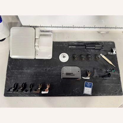 Juki TL-2300 Sumato Sewing Machine with 1/4", 1/8", 1/16", Teflon 3mm Compensating Feet & a Narrow Zip Foot.