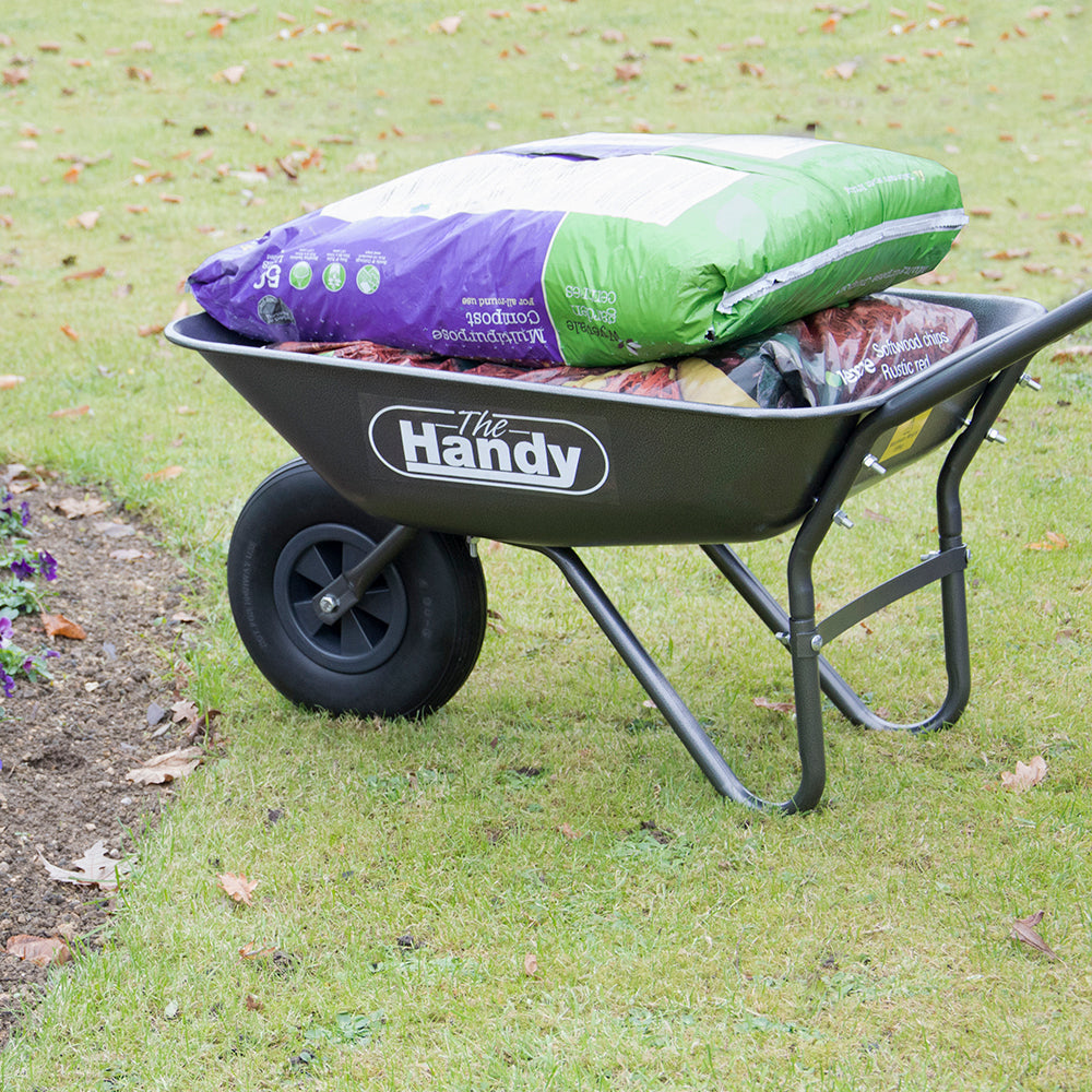The Handy THWB 65 Litre Galvanised Steel Wheelbarrow – product detail or in-use view