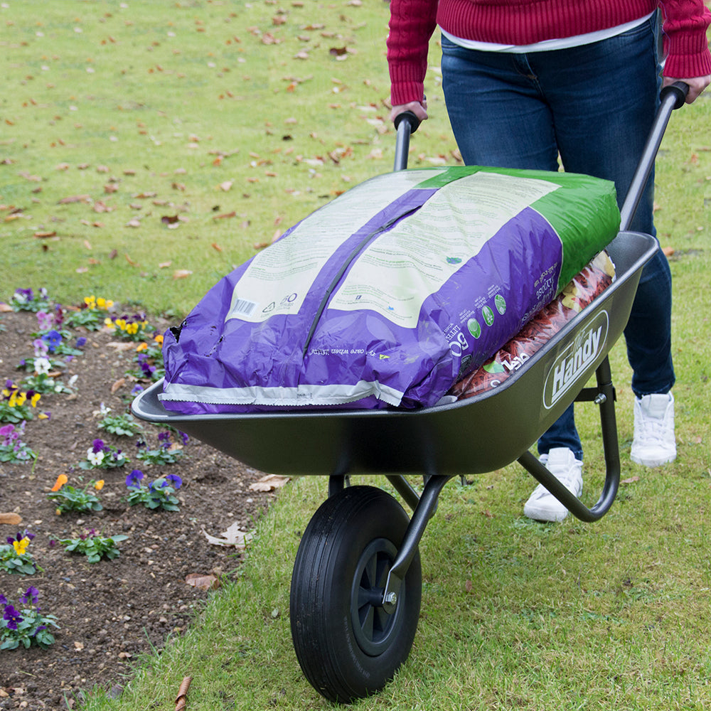The Handy THWB 65 Litre Galvanised Steel Wheelbarrow – product detail or in-use view